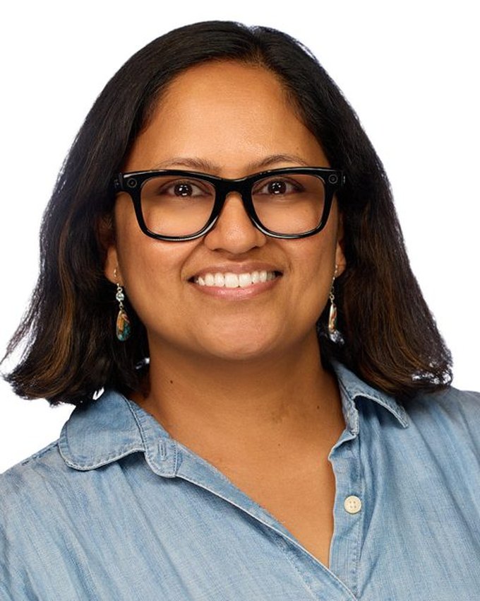 Smruti Phadnis, smiling, turned slightly toward the camera